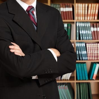 Attorney in front of books on negligent security